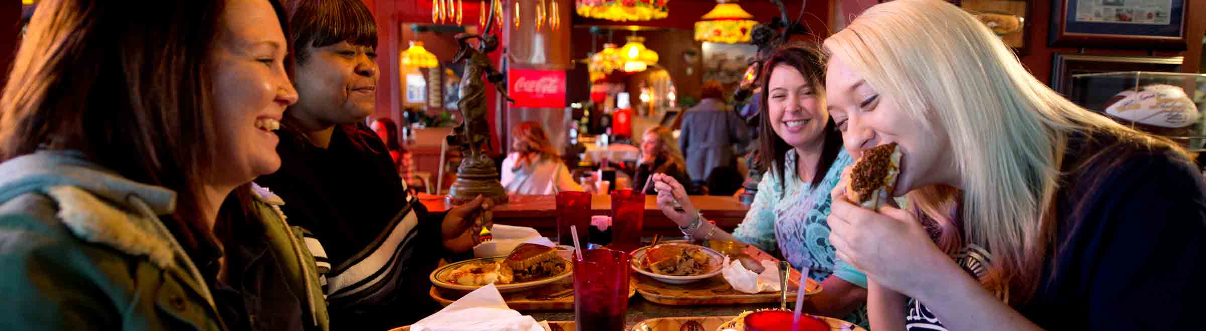 group of 4 ladies enjoying their Packo's meal at Tony Packo's Cafe